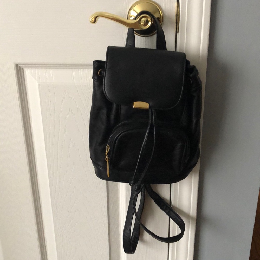 Small black backpack. Genuine leather.